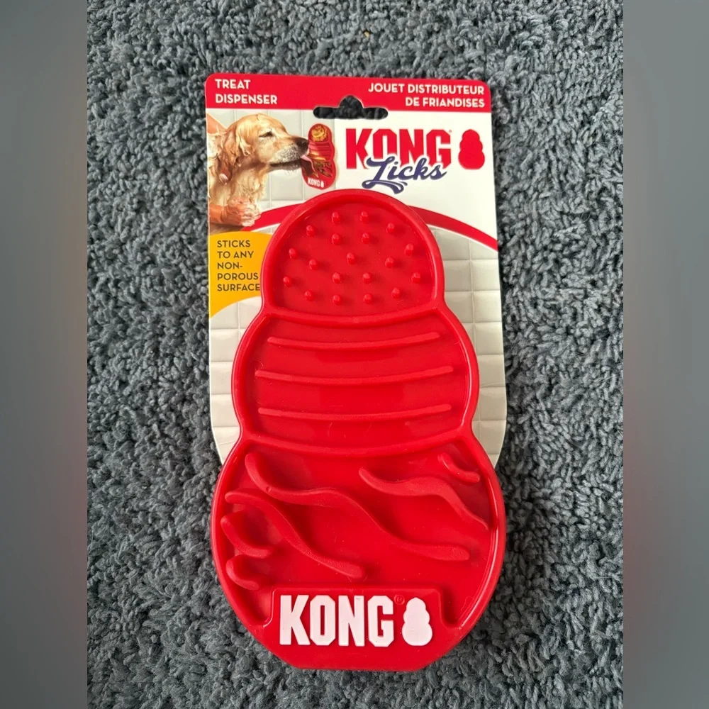 NWT Kong Licks red treat dispenser with suctions on the back
